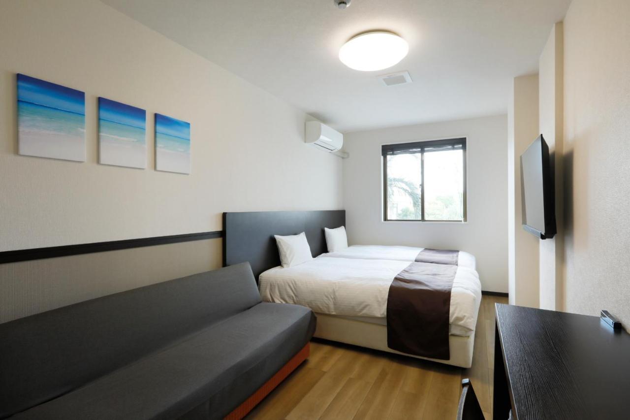 Phoenix Park Hotel Nago Esterno foto
