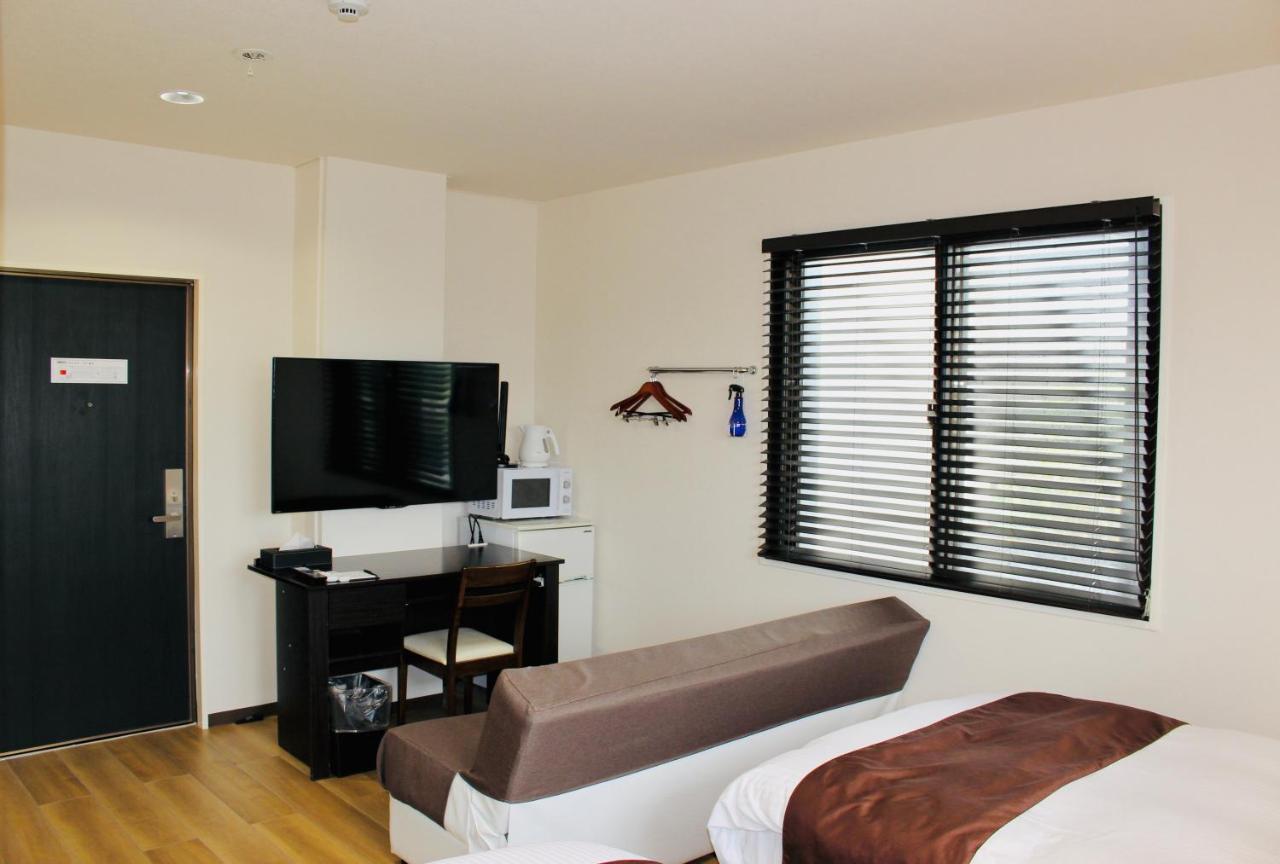 Phoenix Park Hotel Nago Esterno foto