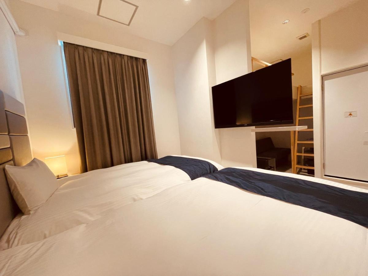 Phoenix Park Hotel Nago Esterno foto
