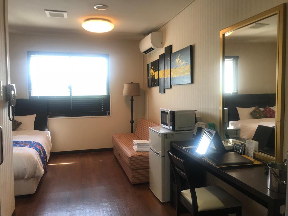 Phoenix Park Hotel Nago Esterno foto