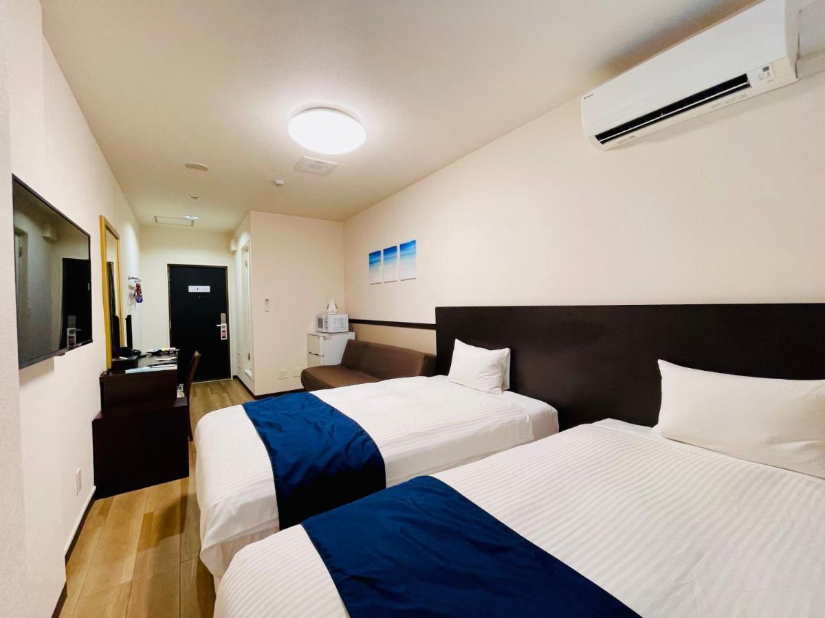 Phoenix Park Hotel Nago Esterno foto